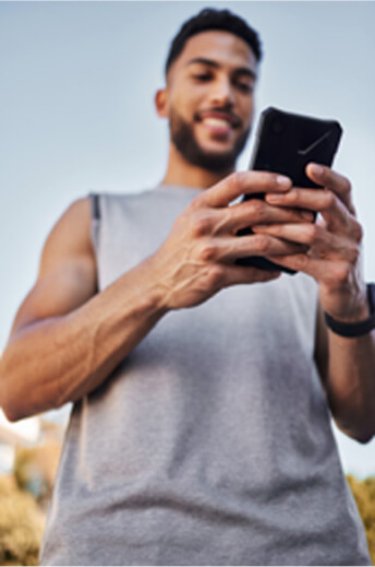 younger man with phone